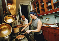 Wenda Gu and his wife Kathryn Scott in their New York home, 2000. 